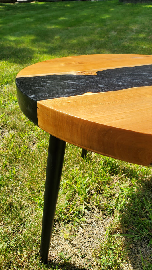 Round Coffee Table made of Walnut and black epoxy resin